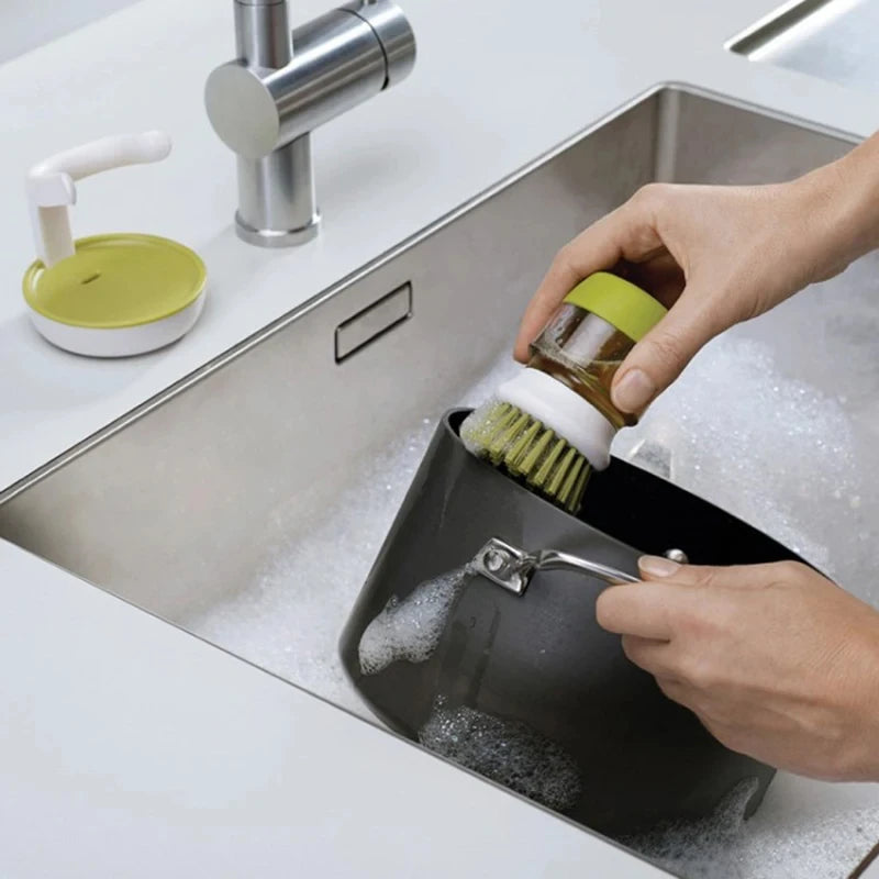 cepillo dispensador 2 en 1
